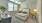 a bedroom with a bed and a fan