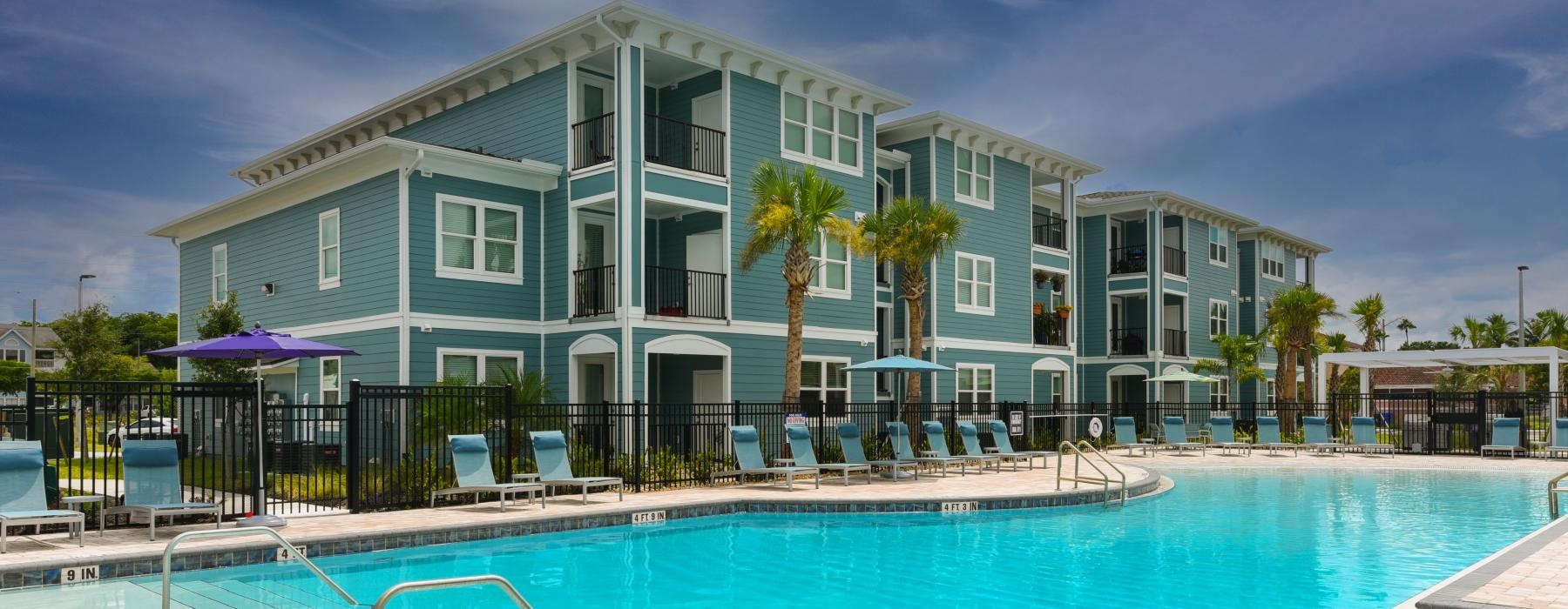 a pool in front of a building